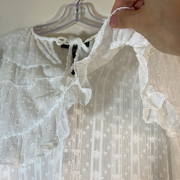 NWT. BCBGMAXAZRIA XS Shimmer Off-White Textured Ruffle Blouse. - Picture 4 of 12